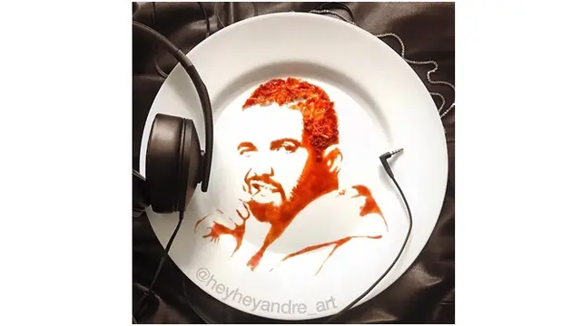 Berbekal saus dan keju, Andre membuat ilustrasi wajah Drake terlihat nyata.