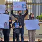 Keluarga korban melakukan aksi menuntut keadilan atas meninggalnya Afif Maulana. (Liputan6.com/ Novia Harlina)