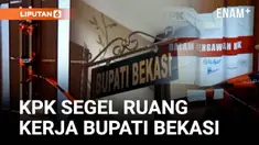 Komisi Pemberantasan Korupsi (KPK) menyegel ruang kerja Bupati Bekasi Ade Kuswara Kunang di kawasan Pemerintahan Kabupaten Bekasi, Kamis malam (18/12). Selain ruang kerja bupati, penyidik juga menyegel tiga kantor dinas di lingkungan Pemerintah Kabup...