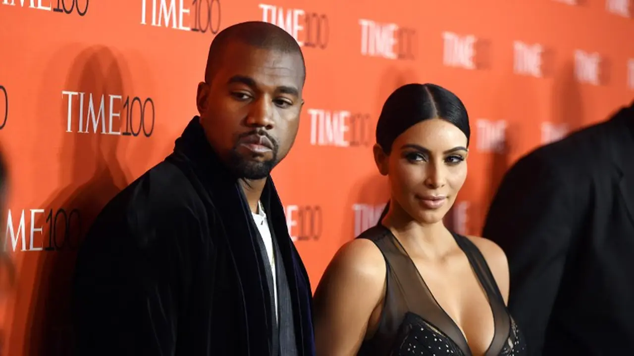Kim Kardashian dan Kanye West tuai komentar pedas. (Foto: AFP)
