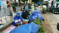 Pengungsi Somalia menelantar di trotoar jalan di depan Rumah Detensi Imigrasi, Kalideres, Jakarta Barat (4/4/2018) (Rizki Akbar Hasan/Liputan6.com)