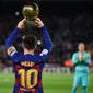 Lionel Messi berhasil mengukir hattrick saat Barcelona bersua Real Mallorca pada laga pekan ke-16 La Liga Spanyol, di Camp Nou, Sabtu (7/12/2019). (AFP/Josep Lago)