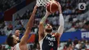 Pemain timnas basket Perancis, Isaia Cordinier saat melawan Lebanon pada penyisihan Grup H FIBA World Cup 2023 di Indonesia Arena, Gelora Bung Karno, Jakarta, Selasa (29/8/2023). (Liputan6.com/Helmi Fithriansyah)