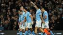Kemenangan 2-1 Manchester City membuat mereka menjaga asa untuk merebut puncak klasemen Liga Inggris. Kini mereka hanya berjarak dua poin dari Arsenal. (AP Photo/Jon Super)