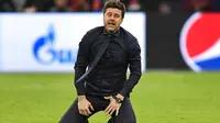 Pelatih Tottenham Hotspur, Mauricio Pochettino, menangis setelah memastikan tim asuhannya ke final Liga Champions 2018-2019 di Johan Cruyff Arena, Amsterdam (9/5/2019). (AP Photo/Martin Meissner)