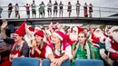 Sejumlah santa claus berlayar selama Kongres Dunia Sinterklas di Kopenhagen, Denmark, Senin (23/7). Bagian terpenting dari kongres tersebut adalah para sinterklas profesional bertemu dengan publik. (Mads Claus Rasmussen/Ritzau Scanpix /AFP)