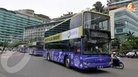 Bus tingkat ini didesain dengan warna mencolok yakni hijau kekuningan dan ungu. Pada bagian depan tertulis 'City Tour Jakarta' (Liputan6.com/JohanTallo).