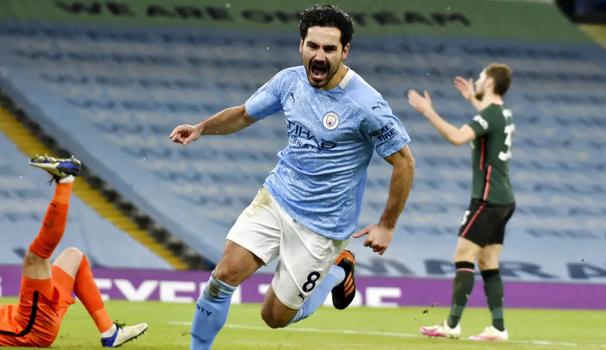 Penyerang Manchester City, Ilkay Gundogan, melakukan selebrasi usai mencetak gol ke gawang Tottenham Hotspur pada laga Liga Inggris di Stadion Etihad, Sabtu (13/2/2021). City menang dengan skor 3-0. (AP photo/Rui Vieira, Pool)