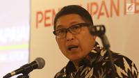 Direktur Utama BEI Inarno Djajadi memamarkan penutupan perdagangan Bursa Efek Indonesia (BEI) di Jakarta, Jumat (28/12). Inarno mengatakan, jumlah etimen tahun 2018 tertinggi sejak privatisasi BEI pada tahun 1992. (Liputan6.com/Angga Yuniar)