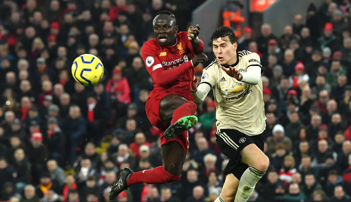 Berkat performa apiknya di Liverpool, klub elite Real Madrid diyakini sangat tertarik untuk mendatangkan Mane. Los Blancos pun kabarnya bersedia menggelontorkan dana besar demi mewujudkan ambisinya tersebut. (AFP/Paul Ellis)