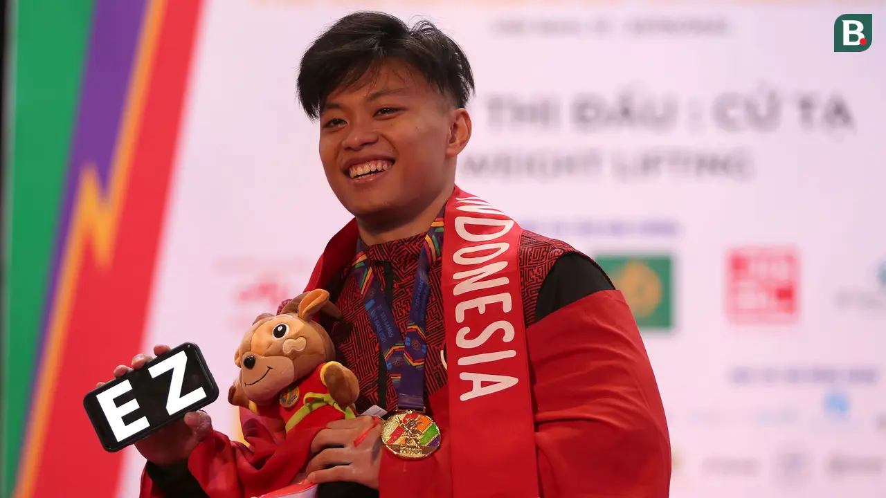 Foto: Tampil Percaya Diri, Rahmat Erwin Abdullah Rebut Emas Angkat Besi di Kelas 73 kg Putra sekaligus Pecahkan Rekor SEA Games