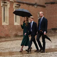 Kate Middleton antar Pangeran George masuk hari pertama sekolah dengan tampilan yang anggun (Photo by Adrian DENNIS / POOL / AFP)