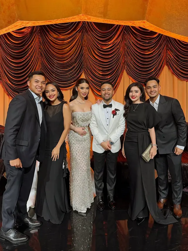 Gaya Serasi Febby Rastanty & Drajad Djumantara Saat Kondangan di Pernikahan Ranggaz Laksmana-Angie Prijanto