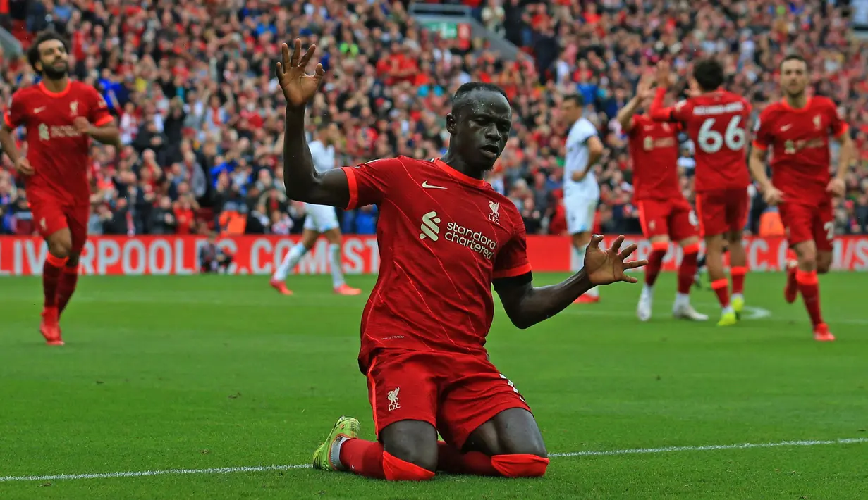 Liverpool sukses bawa poin penuh di depan puluhan ribu fans mereka di Anfield, setelah berhasil mengalahkan Burnley pada pekan kedua Liga Inggris musim 2021/2022. (Foto: AFP/Lindsey Parnaby)