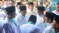 Sambutan meriah PBNU juga terlihat dari karpet merah yang dibentangkan dari pintu masuk sampai ke gedung dalam Kantor PBNU. (merdeka.com/Arie Basuki)