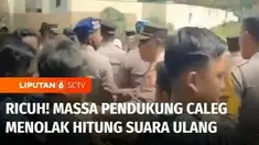 Penghitungan suara ulang di Kantor KPU Sinjai, Sulawesi Selatan, berlangsung ricuh. Massa dari salah satu pendukung caleg menolak dilakukan penghitungan suara ulang.