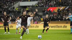 Sementara Jerman cuma mampu membalas lewat Niclas Fullkrug (44’ P), dan Serge Gnabry (87’). (AP Photo/Martin Meissner)