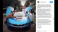 Raffi Ahmad dan Nagita Slavina berpose dengan BMW i8. (Instagram/ raffinagita1717)