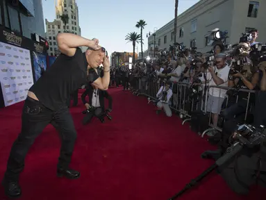 Aktor Vin Diesel berpose di red carpet acara premiere "Guardians Of The Galaxy" di  Hollywood, California, Selasa (22/7/14). (REUTERS/Mario Anzuoni)