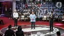 Tiga Calon Presiden, Ganjar Pranowo, Prabowo Subianto dan Anies Baswedan saat debat perdana Pilpres 2024 di halaman Gedung Komisi Pemilihan Umum (KPU), Selasa (12/12/2023). (Liputan6.com/Faizal Fanani)