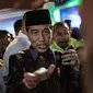 Presiden Joko WIdodo tiba menghadiri Harlah ke-46 PPP di kawasan Ancol, Jakarta, Kamis (28/2). harlah ke-46 PPP mengusung tema ‘Membangun Keluarga Membangun Bangsa’. (Liputan6.com/Faizal Fanani)