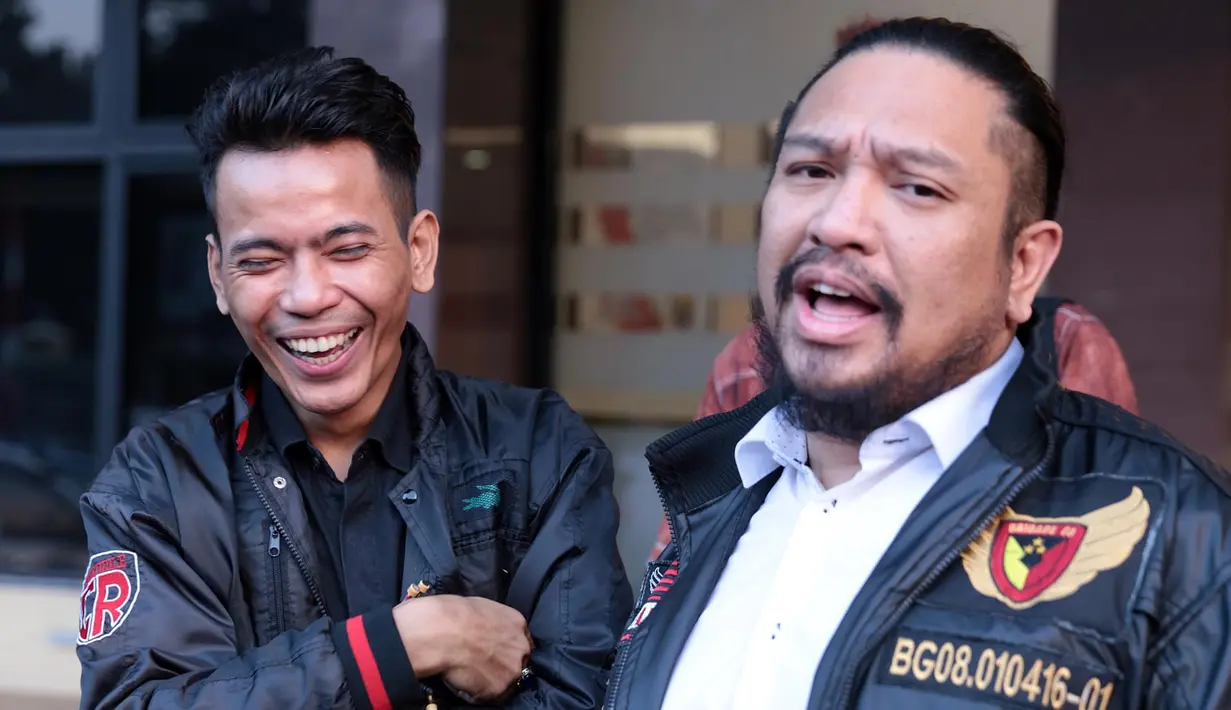 "Saya ke Polres untuk melaporkan saudara Ihsan Idol alias Ihsan Tarore yang telah membuat statement seperti itulah," ucapnya usai membuat laporan di Polres Metro Jakarta Selatan. (Deki Prayoga/Bintang.com)