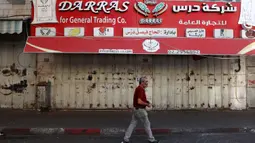 Tutupnya toko-toko ini menyusul seruan pemogokan umum untuk mendukung perjuangan warga Palestina di Jalur Gaza. (Zain JAAFAR/AFP)