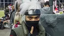 Seorang lelaki berkostum Kakashi dalam anime Naruto di Japan Cultural Institute, Paris, Rabu (2/7/2014) (AFP Photo/FRED DUFOUR) 
