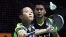 Ekspresi Liliyana Natsir saat mengembalikan kok ke arah pasangan Malaysia, Tan Kian/Lai Peng pada babak pertama Indonesia Open 2018 di Istora Senayan, Jakarta, (3/6/2018). Tontowi/Liliyana menang 21-11 21-14.  (Bola.com/Nick Hanoatubun)