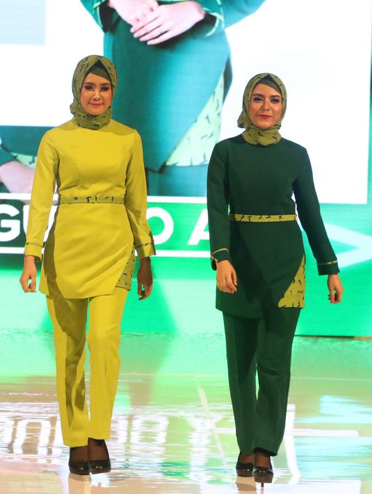 Seragam baru awak kabin berhijab maskapai penerbangan Citilink Indonesia diperkenalkan di Jakarta, Senin (19/3). Berdasarkan catatan Citilink, 1 dari 5 pramugari mengenakan hijab. (Liputan6.com/Arya Manggala)