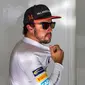 Fernando Alonso mengaku tak pernah menyesali keputusan hengkang dari Ferrari pada akhir 2014. (EPA/Srdjan Suki)