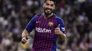 Suarez juga satu-satunya pemain yang berhasil meraih gelar El Pichichi dibawah dominasi Messi-Ronaldo musim 2015/16. Bersama Messi, Suarez adalah kran gol Barcelona musim ini. (AFP/Javier Soriano)