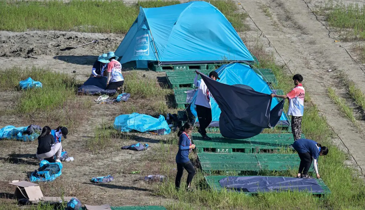 "Kondisi peserta Indonesia semua dalam keadaan aman dan tetap bersemangat," kata Yuniar. (Anthony WALLACE/AFP)