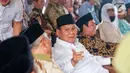 Kehadirannya juga disambut pertunjukkan marawis dan lantunan selawat dari para peserta yang hadir. (Liputan6.com/Angga Yuniar)