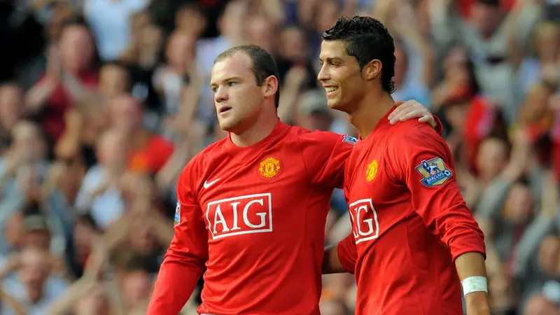 Wayne Rooney dan Cristiano Ronaldo (AFP PHOTO/ANDREW YATES)