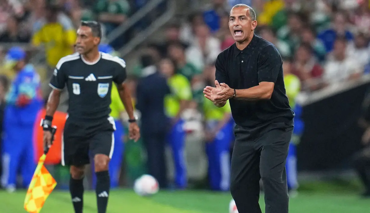 Dikutip dari laporan The Guardian, Federasi Sepak Bola Tunisia (FTF) dilaporkan memecat pelatih Sabri Lamouchi di tengah berlangsungnya Piala Dunia 2026. (AP Photo/Matias Delacroix)