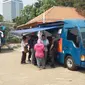 Mobil Penukaran Uang BI di Lapangan Lenggang Jakarta, Monas, Jakarta Pusat (Foto: Fiky Ariyanti/Liputan6.com).