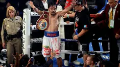 Petinju Filipina, Manny Pacquiao, sukses merebut kembali gelar juara dunia kelas Walter WBO, setelah dinyatakan menang mutlak atas rivalnya Timothy Bradley, Sabtu waktu setempat atau Minggu (13/4/2014). (REUTERS/Joe Camporeale-USA TODAY)
