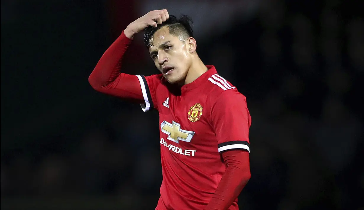 Alexis Sanchez menerima keputusan pengadilan tersebut karena menyadari telah memalsukan penjualan hak gambarnya kepada perusahaan asing agar tidak membayar pajak, dan akan melunasi dalam kurun waktu dua tahun. (Nick Potts/PA via AP)