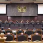 Suasana sidang uji UU BUMN di Jakarta, Senin (5/3). Mahkamah Konstitusi mengelar sidang pengujian UU No 19 tahun 2003 tentang Badan Usaha Milik Negara dengan agenda pemeriksaan pendahuluan. (Liputan6.com/Angga Yuniar)