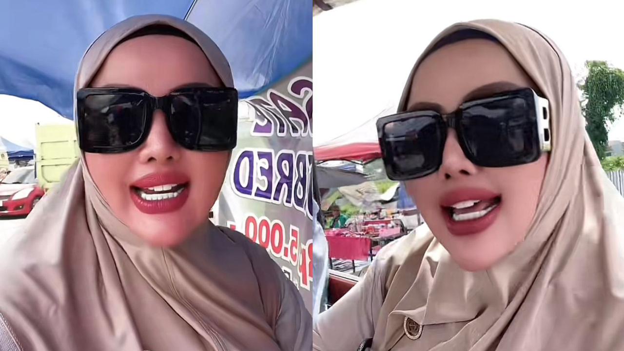 Wiwin Komalasari atau sering disapa Kades Wiwin yang merupakan Kades Gunung Menyan jadi sorotan dan viral di media sosial karena penampilannya yang dinilai cetar. (Dok: TikTok)