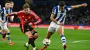 Hingga pertandingan usai tidak ada lagi gol tercipta, skor imbang 1-1 tidak berubah. (ANDER GILLENEA/AFP