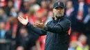 Jurgen Klopp tercatat telah berhasil mempersembahkan empat gelar bagi Liverpool, yaitu Liga Inggris, Liga Champions, Piala Super Eropa, dan Piala Dunia Antarklub. Selama bekerja di Anfield, Klopp mendapatkan bayaran sebesar 15 juta pounds. (AFP/Lindsey Parnaby)