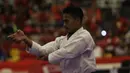 Penampilan karateka Indonesia, Ahmad Zigi Zaresta saat final nomor Junior Kata pada Kejuaraan Dunia Karate Junior, Cadet dan U-21 di ICE, BSD, Tangerang, Kamis (12/11/2015). (Bola.com/Vitalis Yogi Trisna)