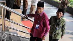 Ketua PPATK, Muhammad Yusuf Ali (kiri) saat menghadiri acara buka puasa bersama di Gedung KPK, Jakarta, Kamis (9/7/2015). Presiden dan Wapres ikut hadir dalam acara tersebut. (Liputan6.com/Helmi Afandi)