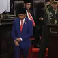 Presiden Joko Widodo atau Jokowi turun dari mimbar usai menyampaikan Pidato Kenegaraan pada Sidang Tahunan MPR 2019 di Kompleks Parlemen, Senayan, Jakarta, Jumat (16/8/2019). Jokowi akan menyampaikan pidato dalam tiga sesi dengan tema yang berbeda selama acara berlangsung. (Liputan6.com/Johan Tallo)