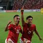 Bek Timnas Indonesia, Pratama Arhan (kanan), merayakan gol indahnya ke gawang Malaysia dalam lanjutan Piala AFF 2020 di National Stadium, Singapura, Minggu (19/12/2021) WIB. (Dok. PSSI)
