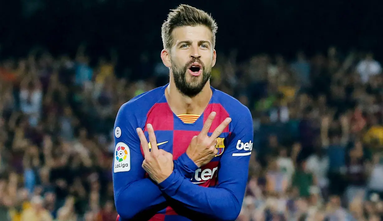 Gerard Pique - Bek tangguh ini merupakan salah satu produk terbaik yang pernah dihasilkan La Masia. Pemain yang sempat disia-siakan MU ini akhirnya pulang ke Camp Nou dan meraih segudang trofi bersama Barcelona. (AFP/Pau Barrena)