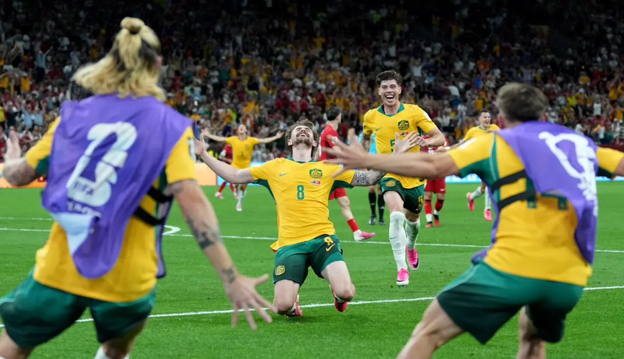 Pemain Australia merayakan kemenangan atas Turki pada laga matchday 1 Grup D Piala Dunia 2026 di BC Place, Vancouver, Kanada, Minggu (14/6/2026) siang WIB. (AP Photo/Abbie Parr)