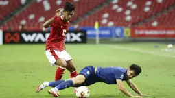 Pratama Arhan. Bek kiri Timnas Indonesia milik PSIS Semarang berusia 20 tahun yang tampil cemerlang dalam ajang Piala AFF 2020 dengan menyabet gelar pemain muda terbaik ini kabarnya tengah diminati oleh klub Korea Selatan yang berkompetisi di K-League 2, Daejeon Hana Citizen. (AP/Suhaimi Abdullah)